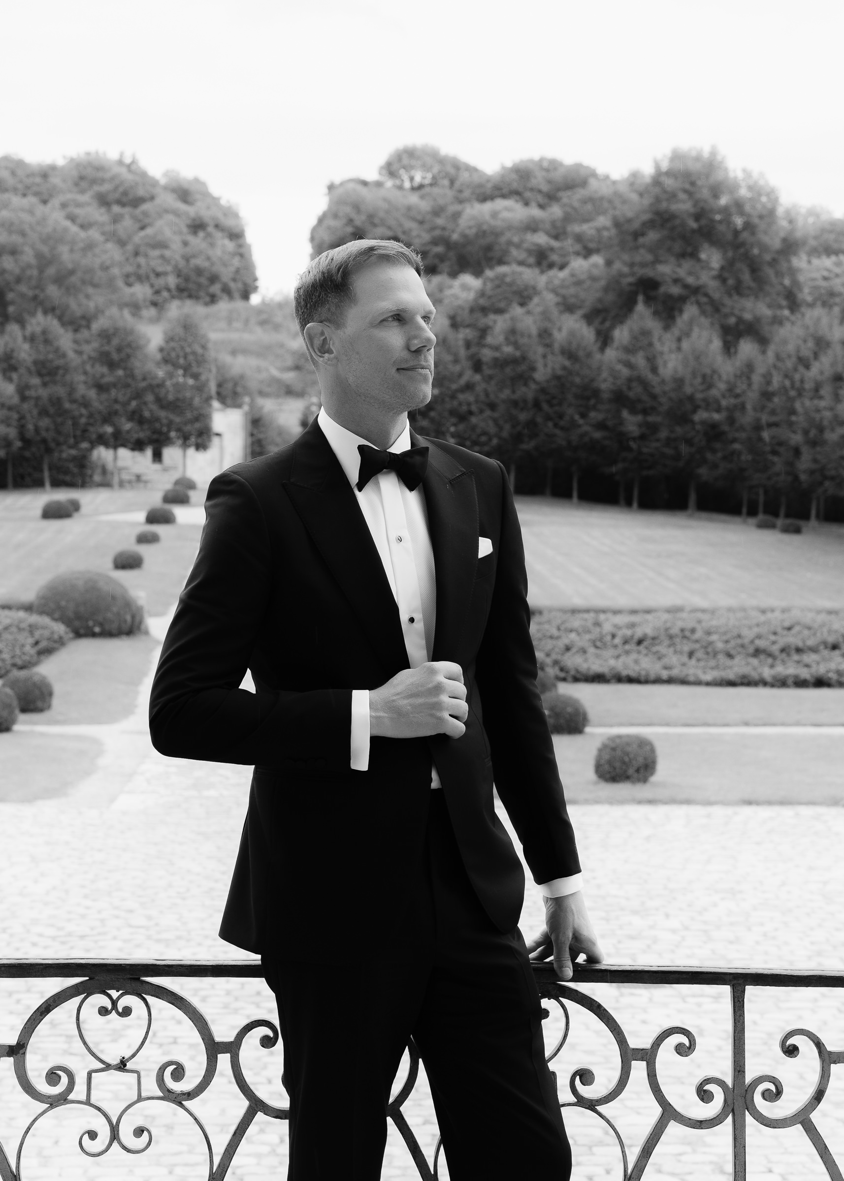 Groom getting ready at Château Villette before her wedding ceremony in Paris