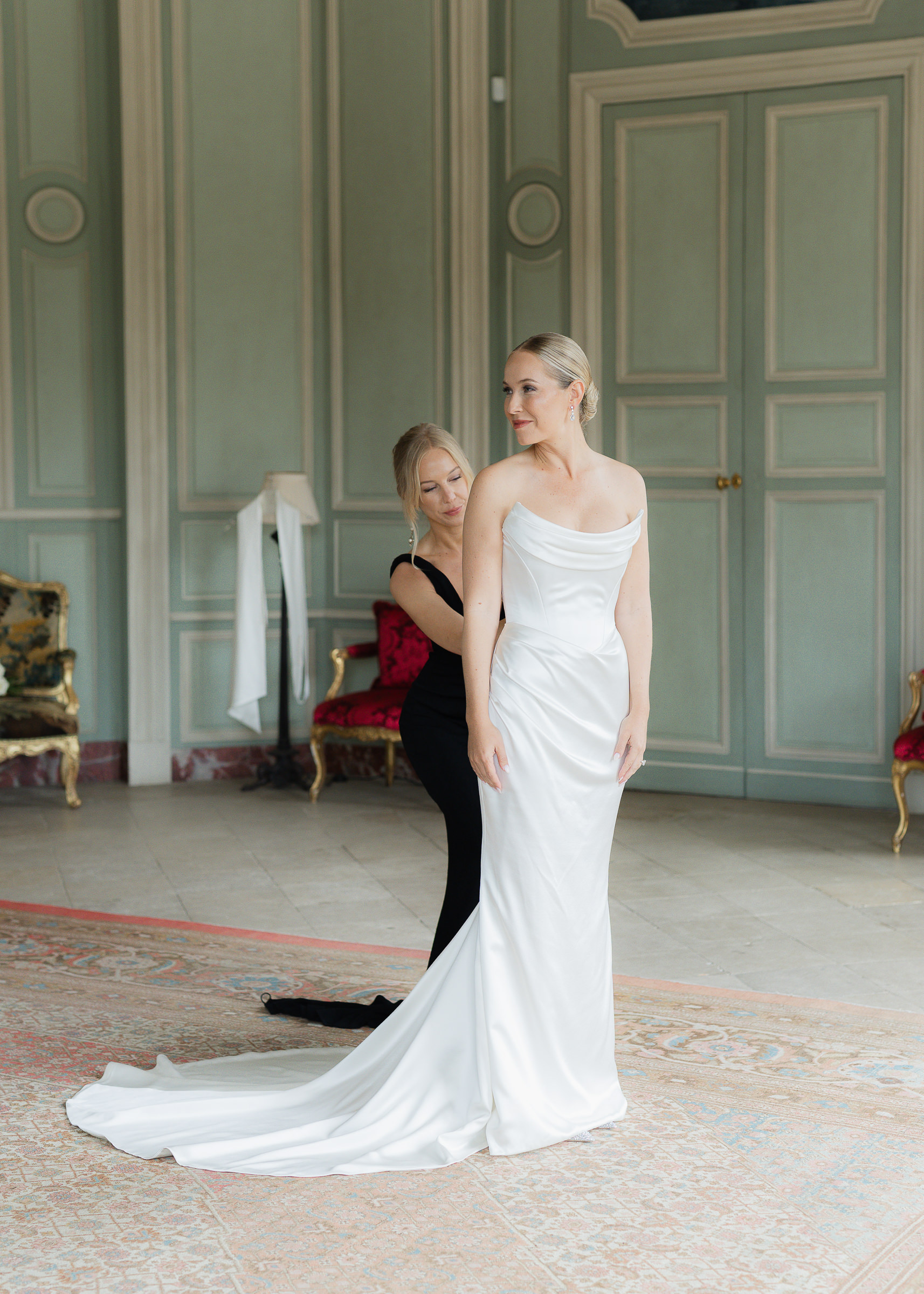 Bride getting ready inside Château Villette before her wedding ceremony in Paris