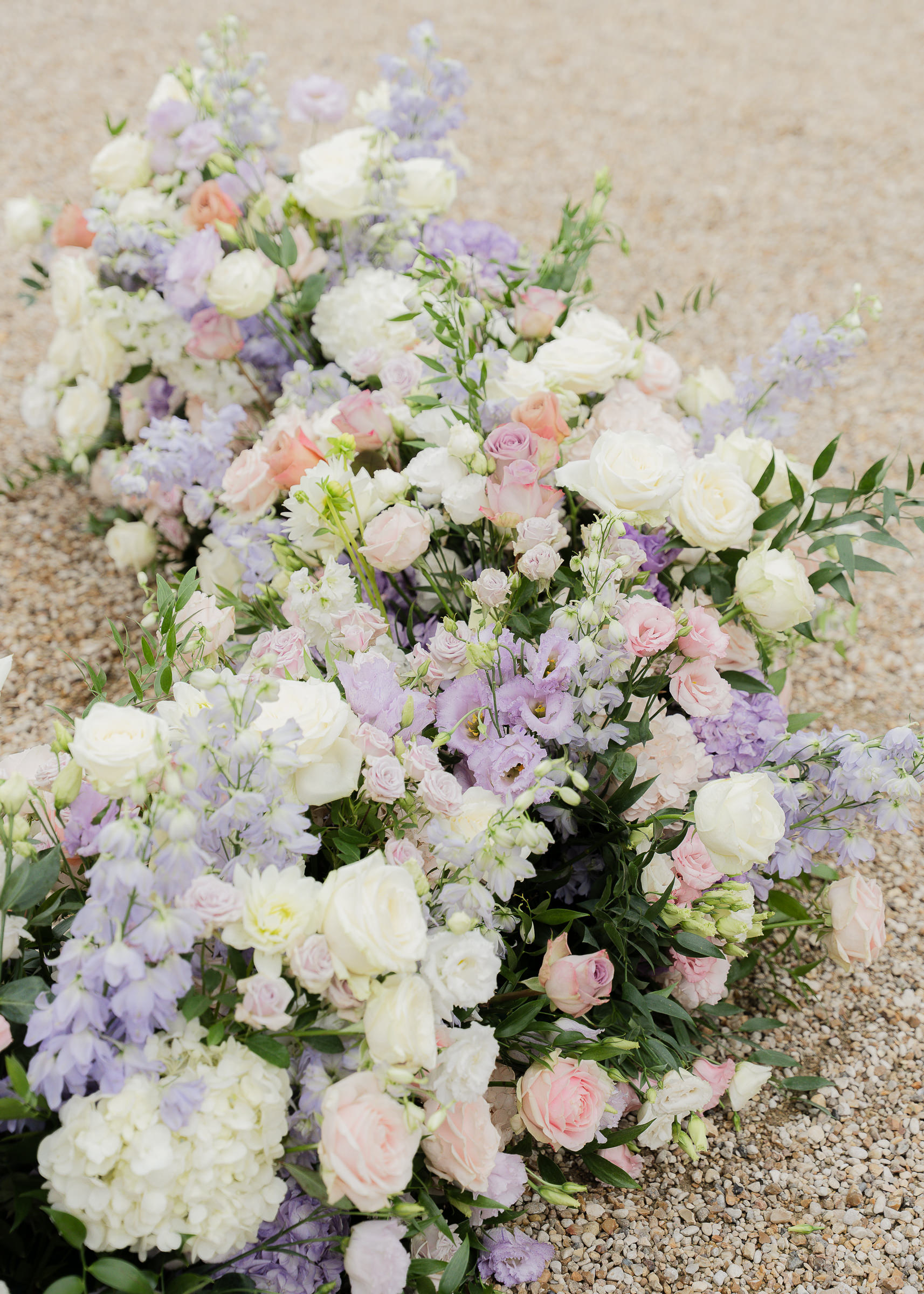Floral arrangements and décor details at Château Villette French wedding ceremony