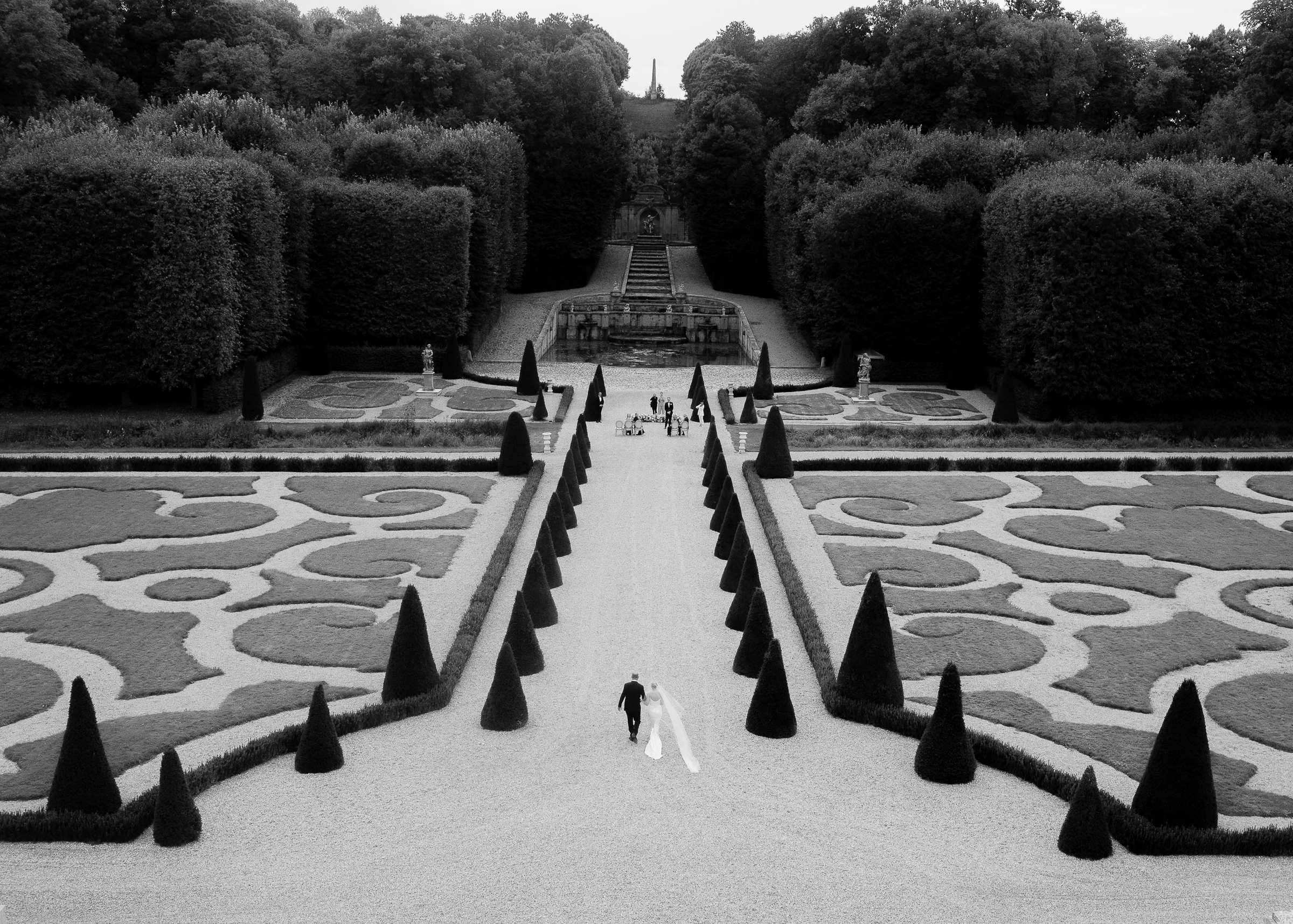 Bride walking down the aisle with father at Château Villette intimate wedding in Paris