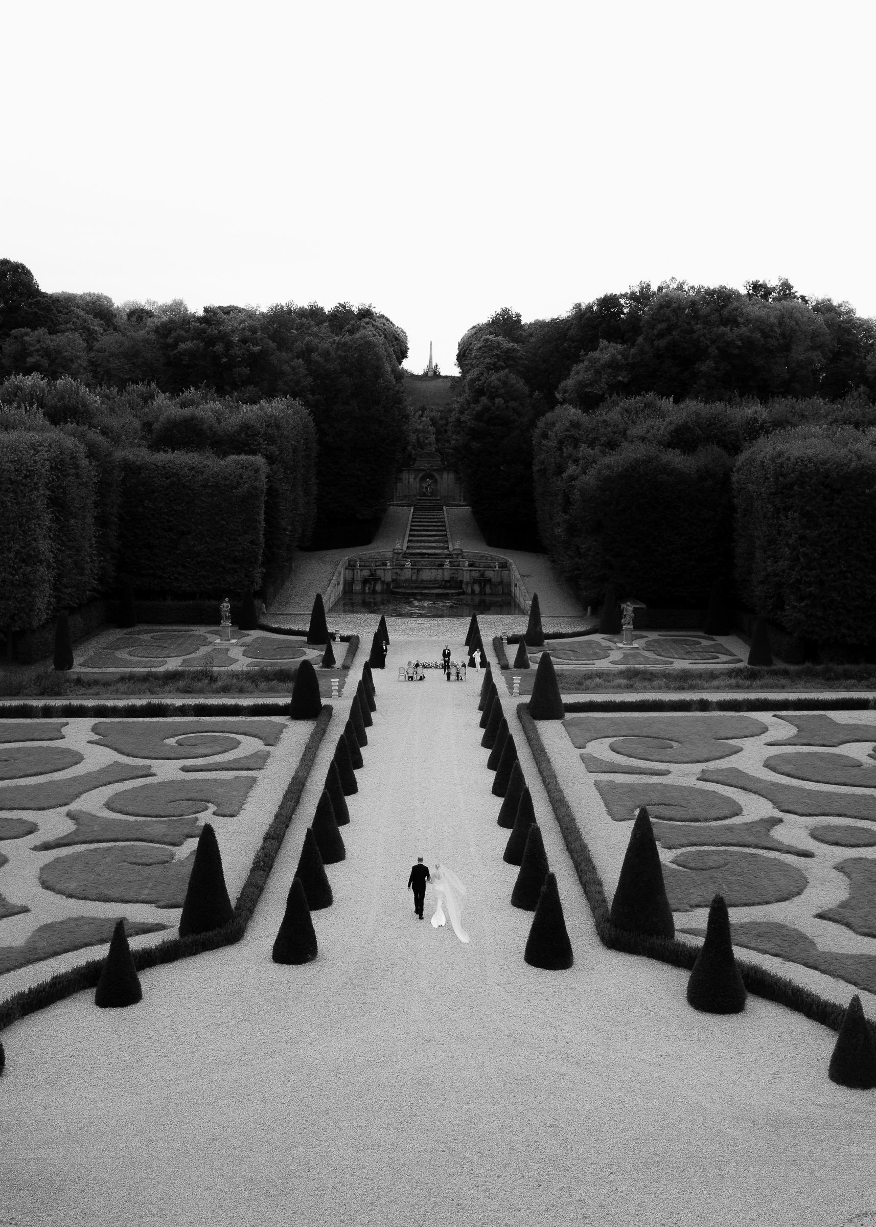 Bride walking down the aisle with father at Château Villette intimate wedding in Paris