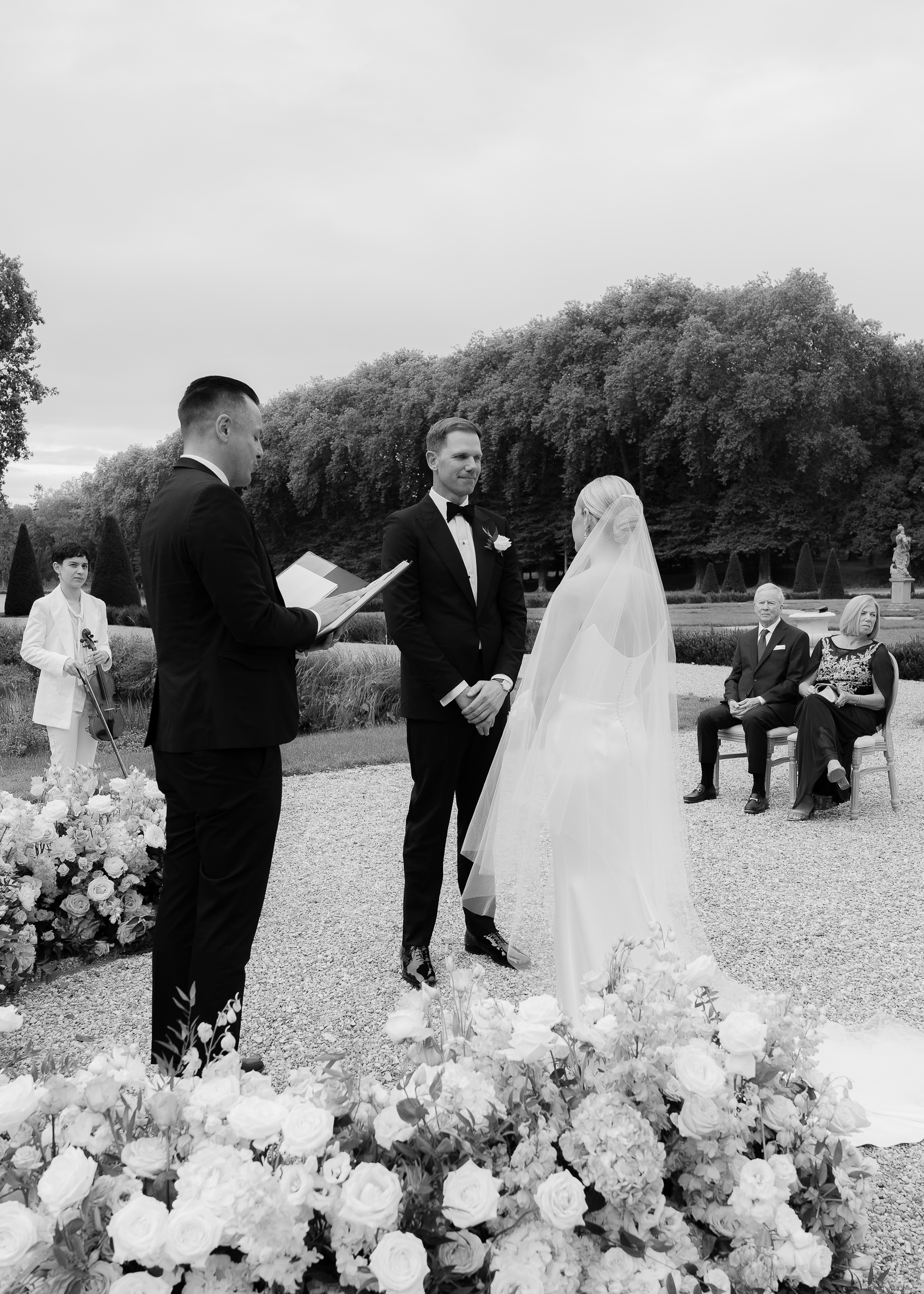 Bride and groom exchanging vows at Château Villette wedding ceremony near Paris