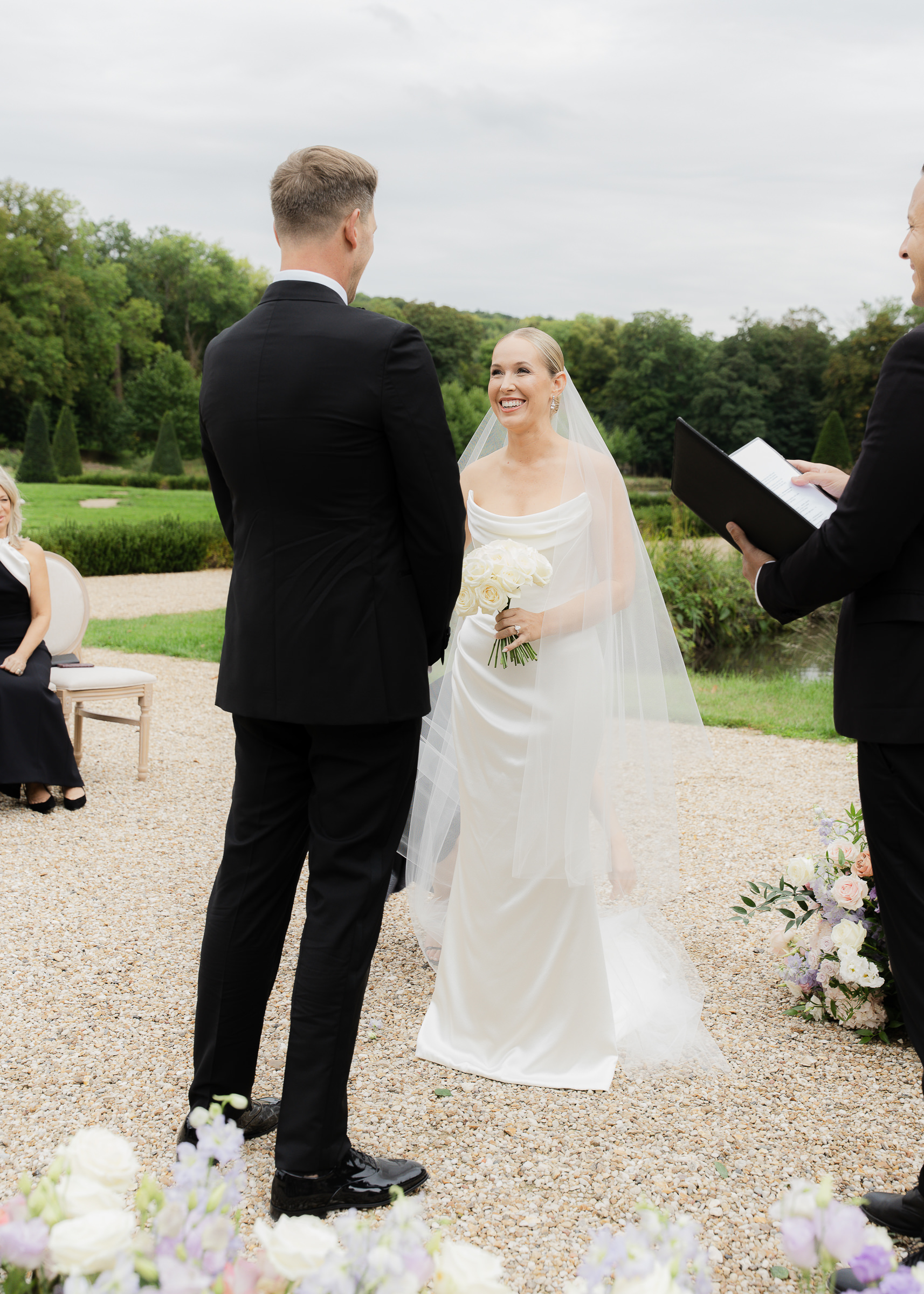 Bride and groom exchanging vows at Château Villette wedding ceremony near Paris