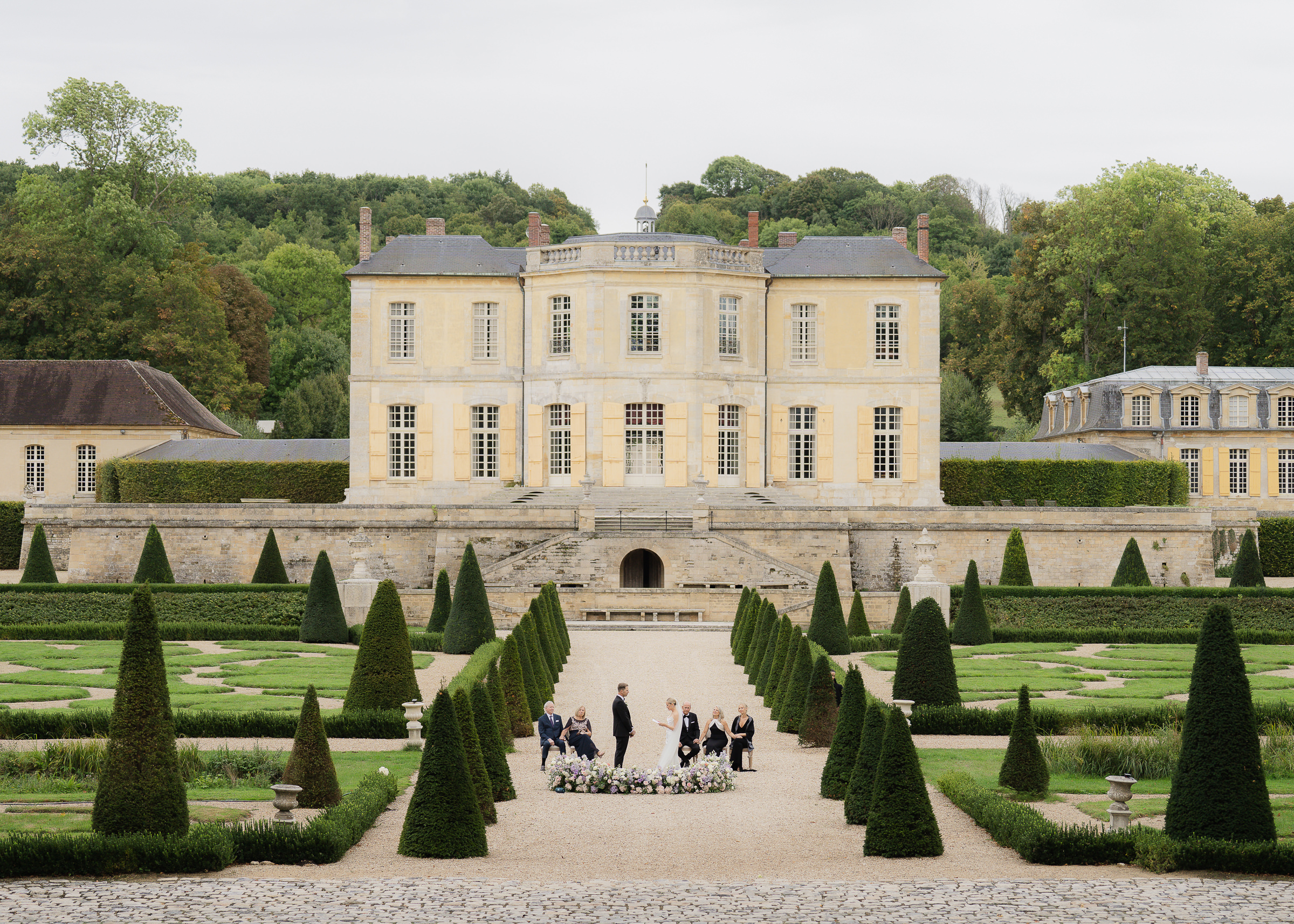 Bride and groom exchanging vows at Château Villette wedding ceremony near Paris
