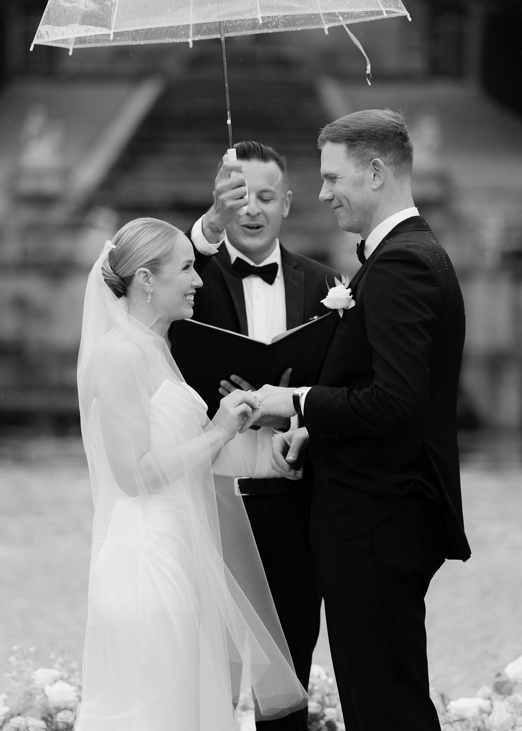 Romantic rainy ceremony at Château Villette, Paris destination wedding photographer