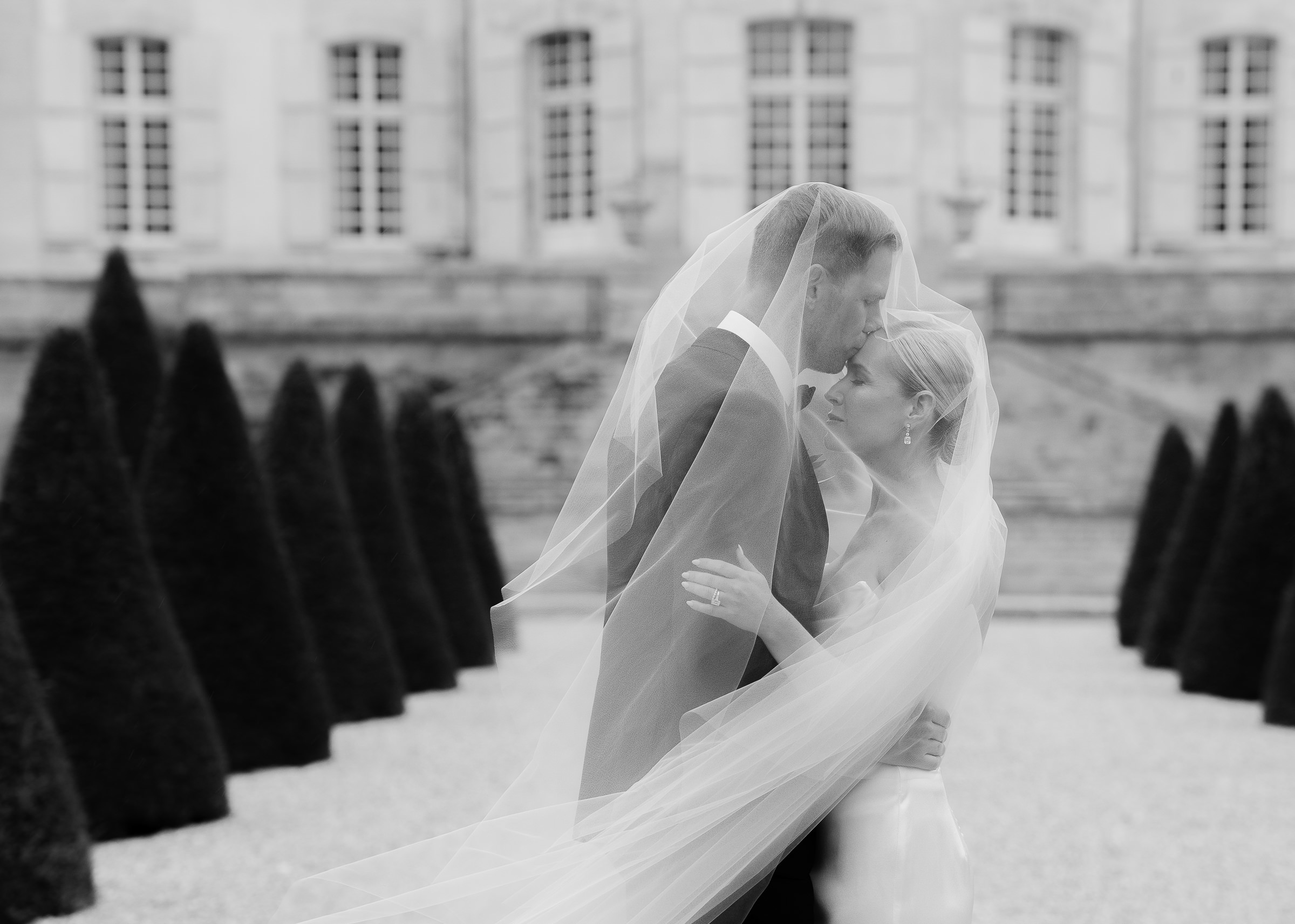 Romantic couple portraits in the gardens of Château Villette, Paris wedding photographer