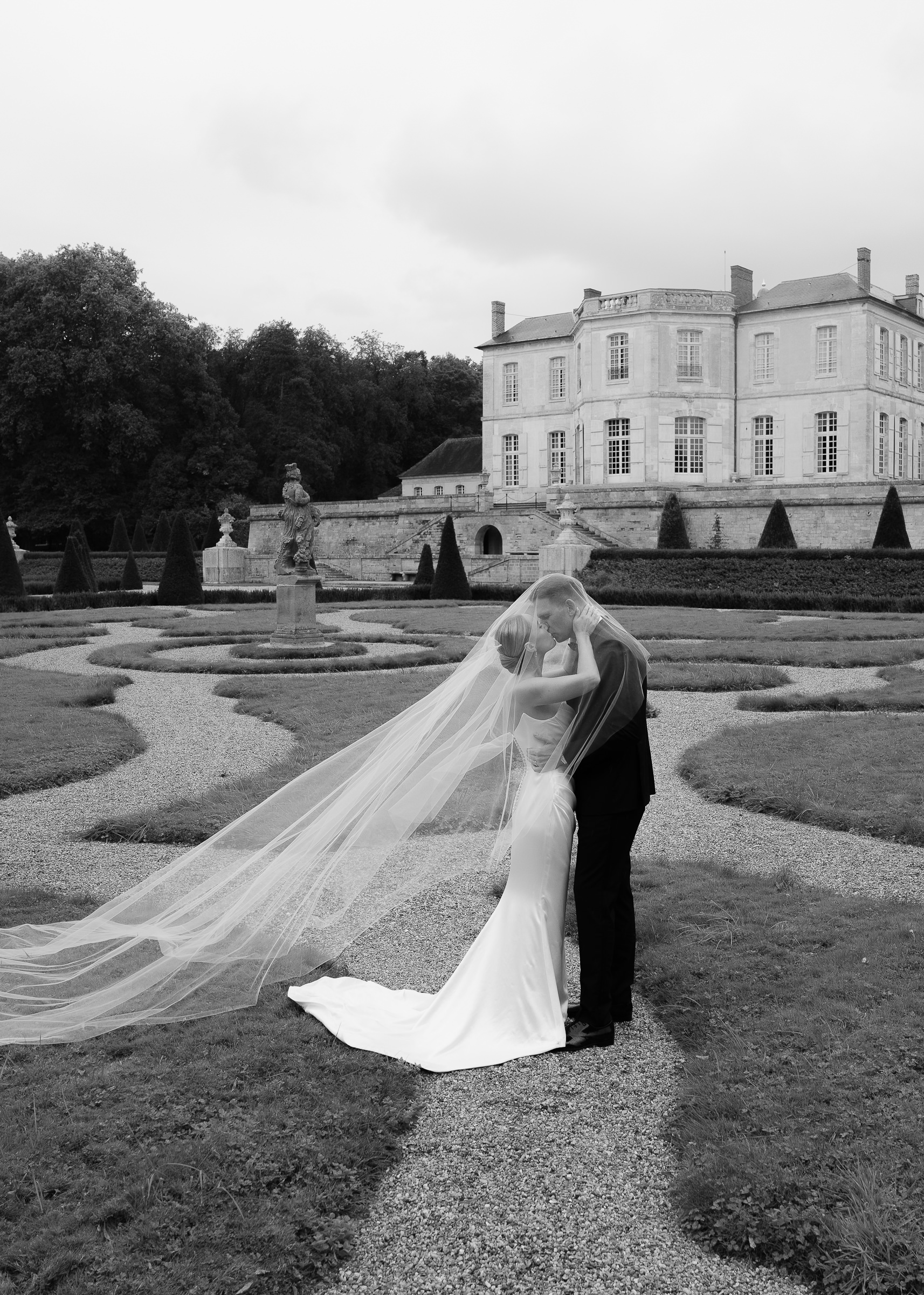 Romantic couple portraits in the gardens of Château Villette, Paris wedding photographer