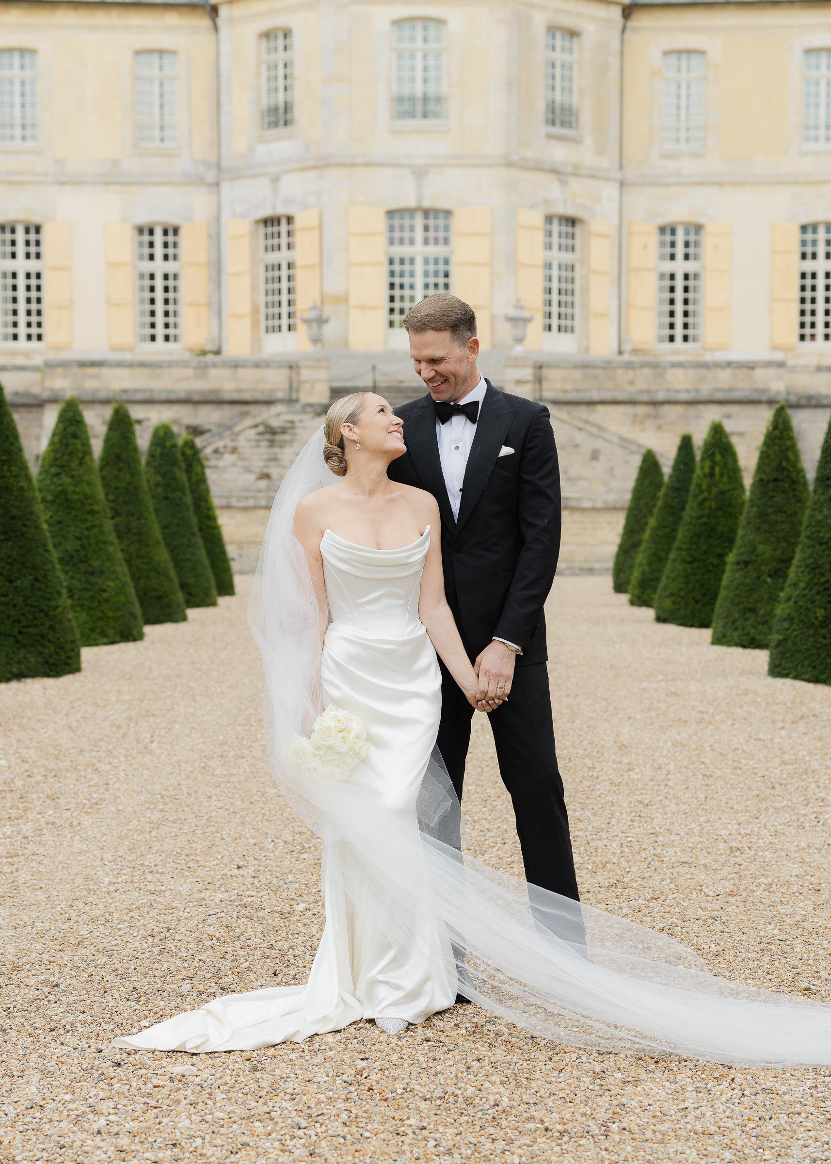 Romantic couple portraits in the gardens of Château Villette, Paris wedding photographer