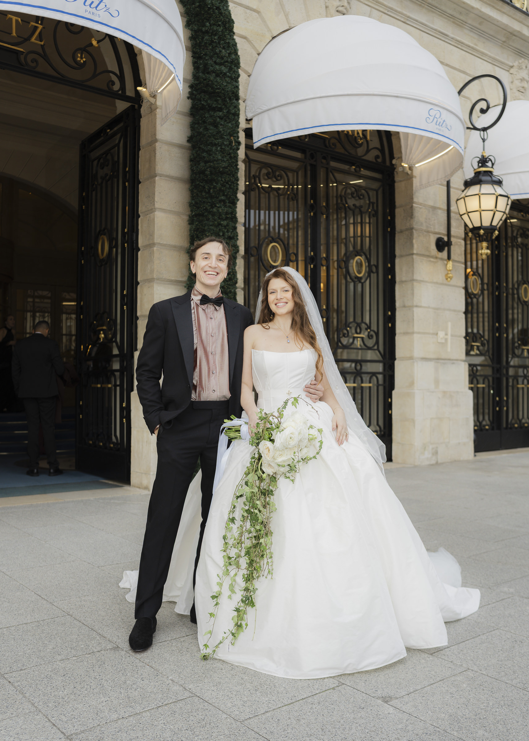 Editorial-style wedding portraits of the couple in Paris