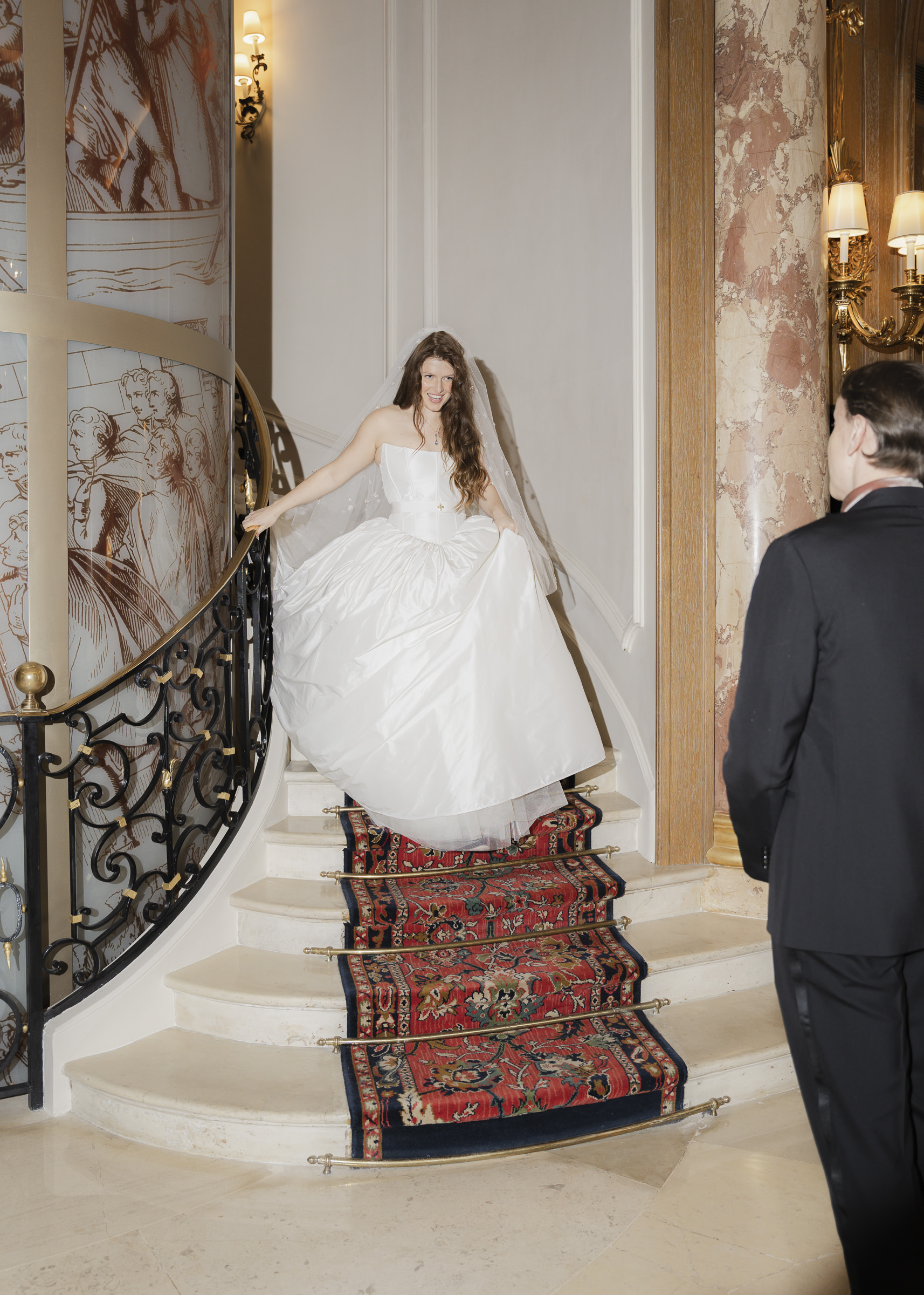 Bride and groom sharing their first look during an intimate autumn wedding in Paris