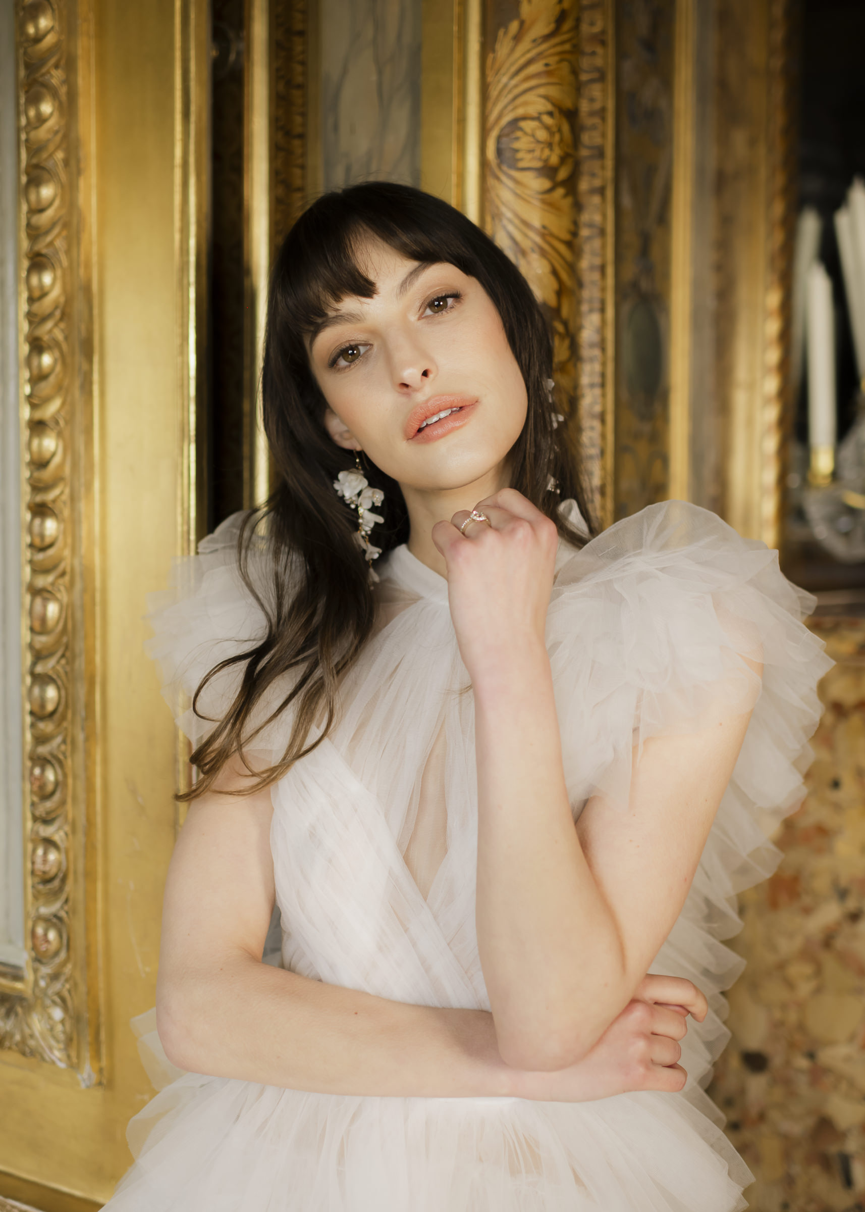 Luxury portrait of bride inside Château de Vaux-le-Vicomte wearing couture dress