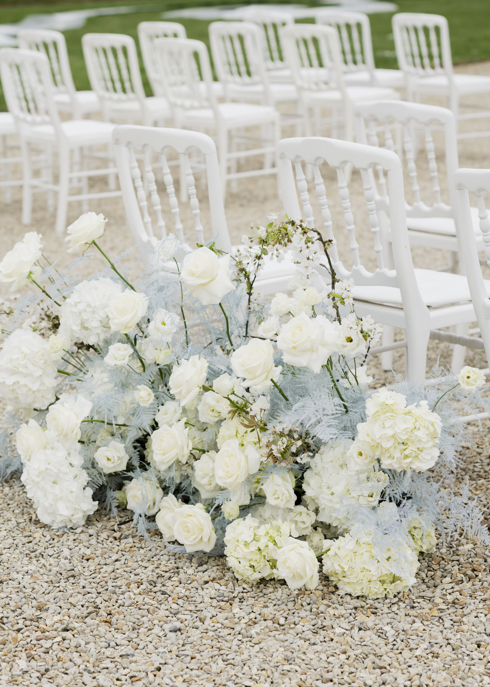 Ceremony floral details styled for a modern luxury château wedding