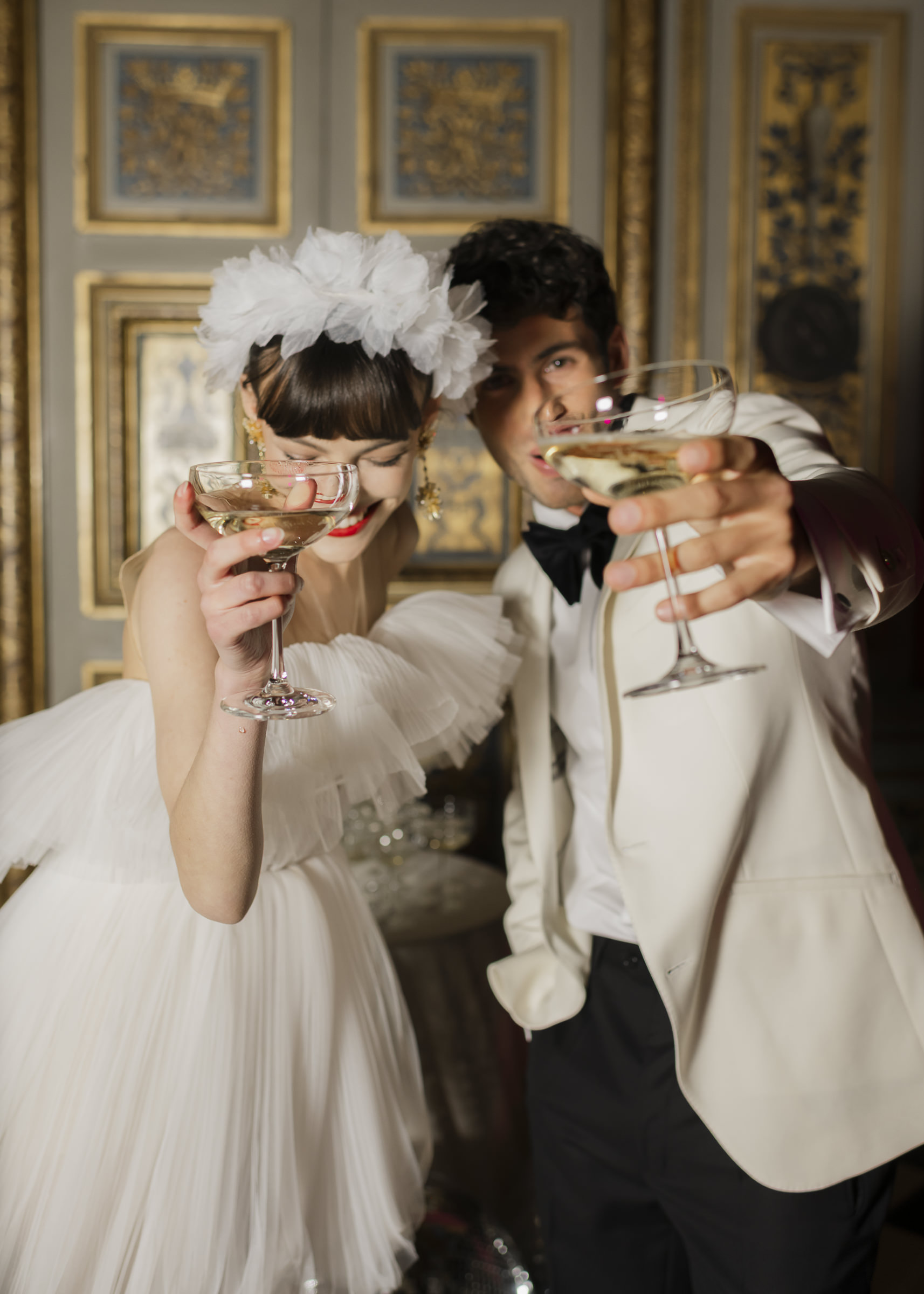 Evening wedding celebration at Château de Vaux-le-Vicomte with champagne