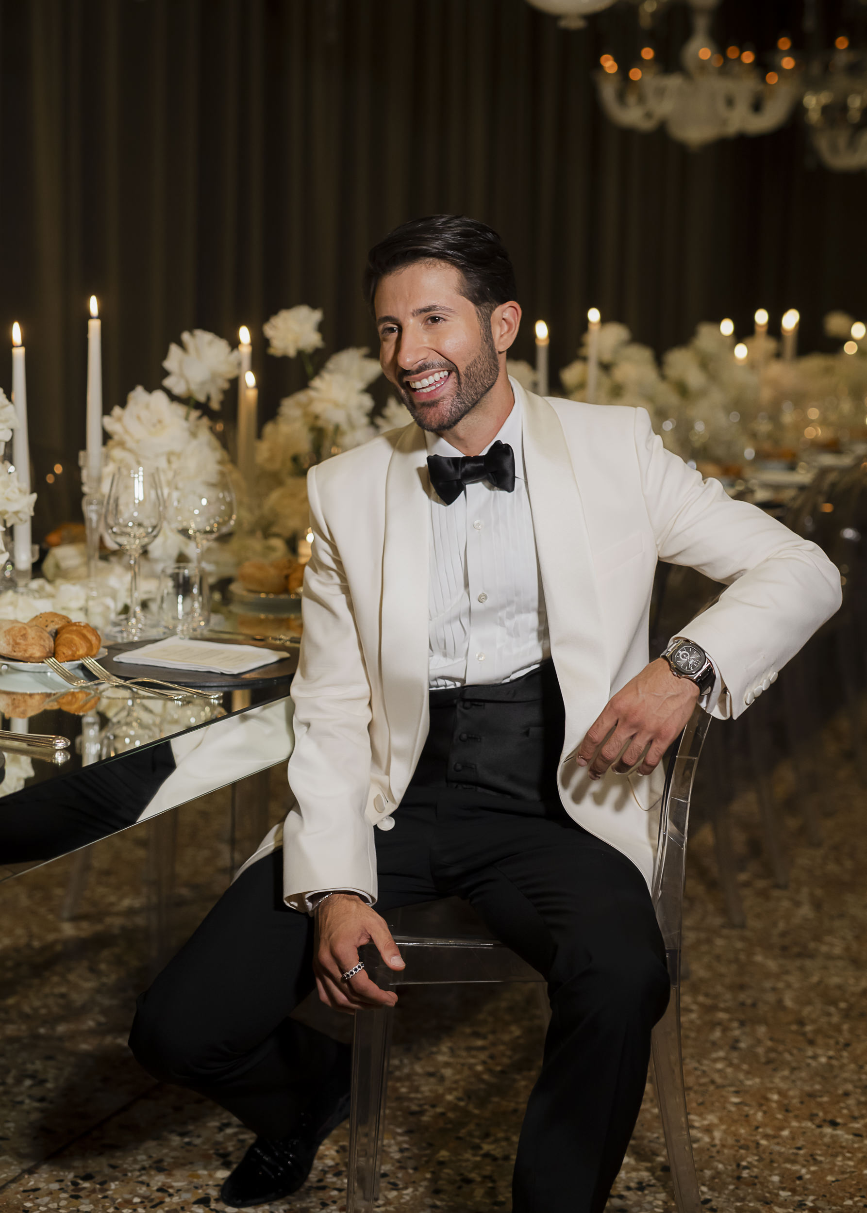 Guest of honour beside a candlelit table setting in Venice