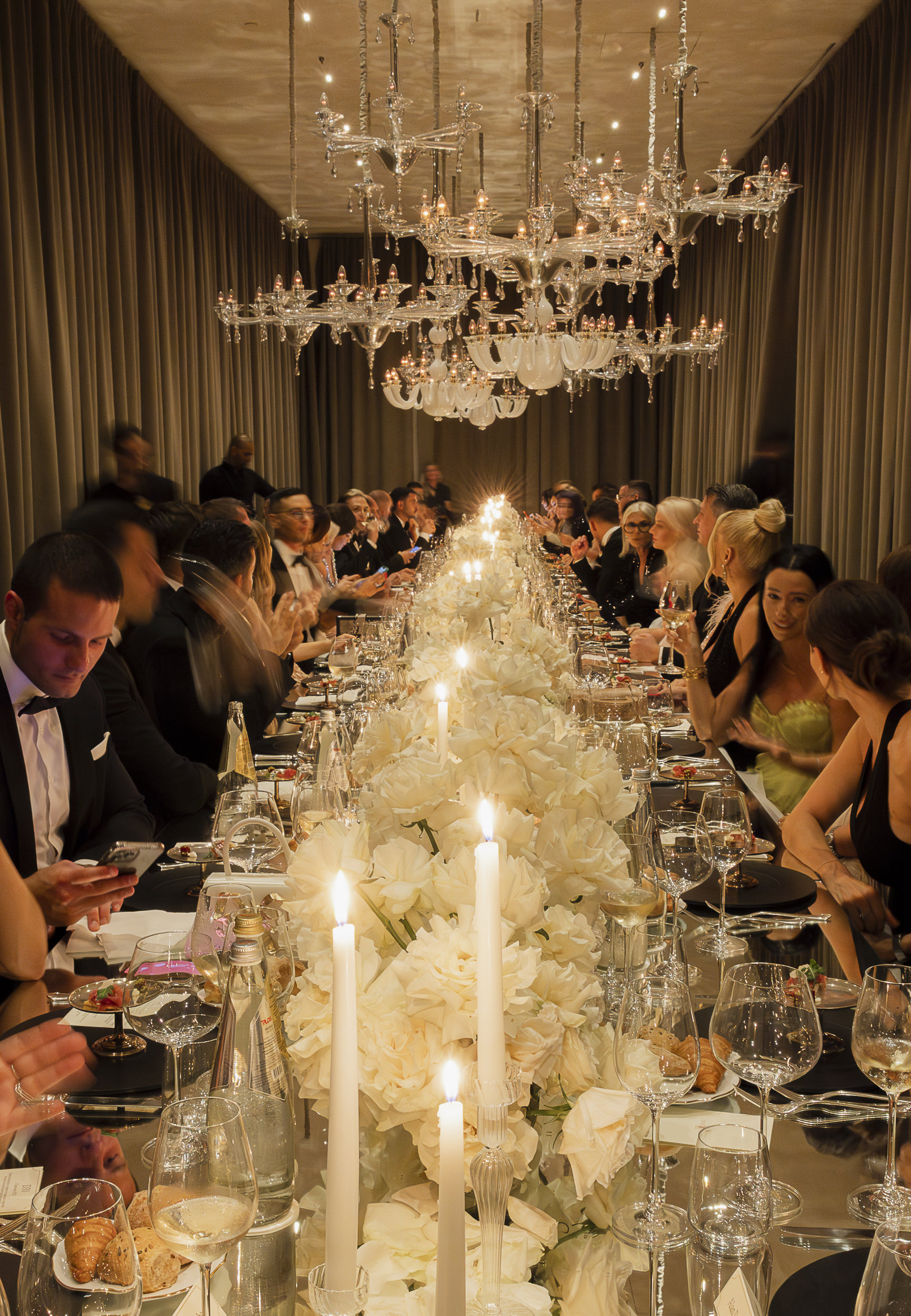 Guests at the candlelit dinner at a private celebration at The Venice Venice Hotel