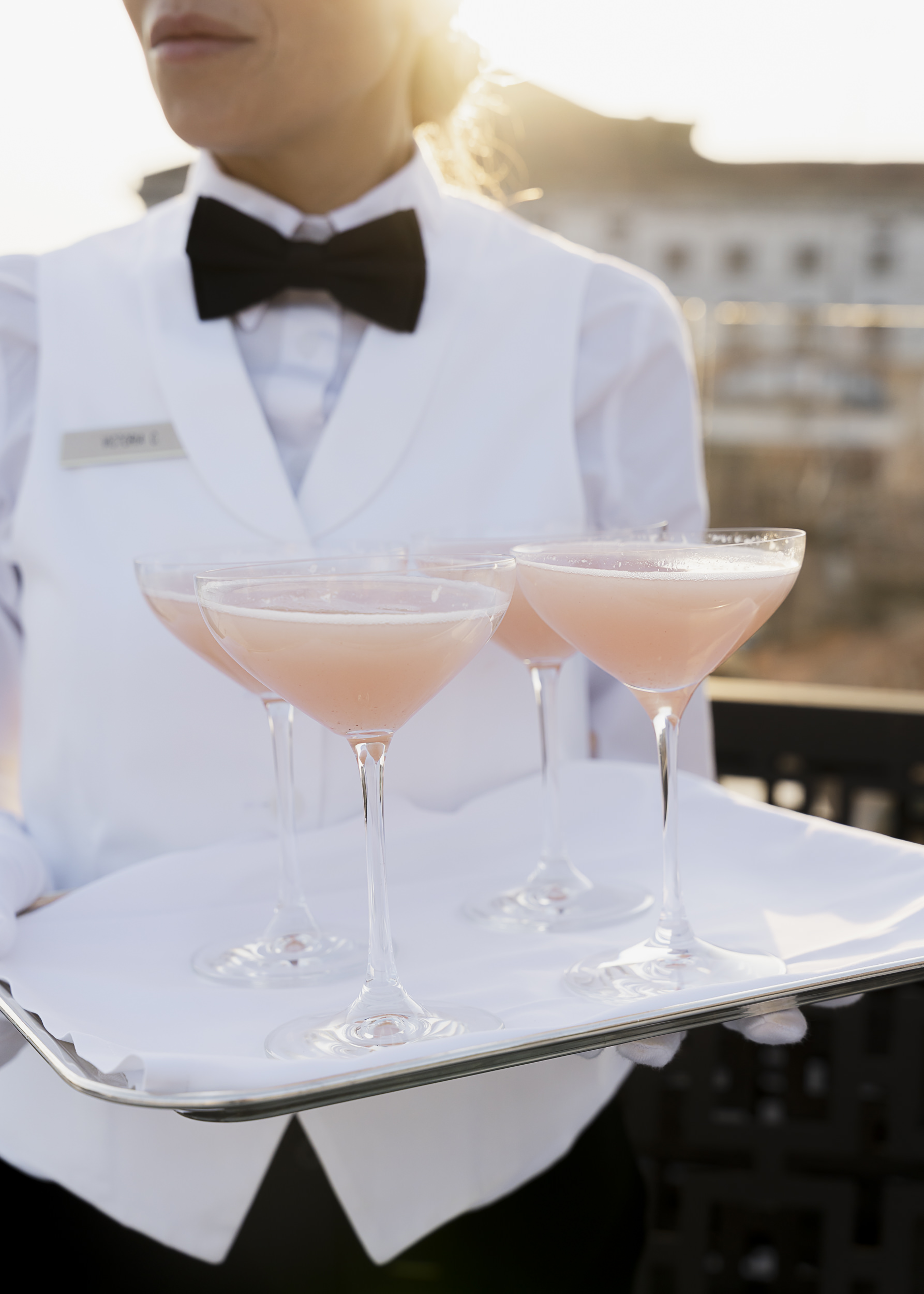 Colour-coordinated cocktails served during a rooftop gathering in Venice