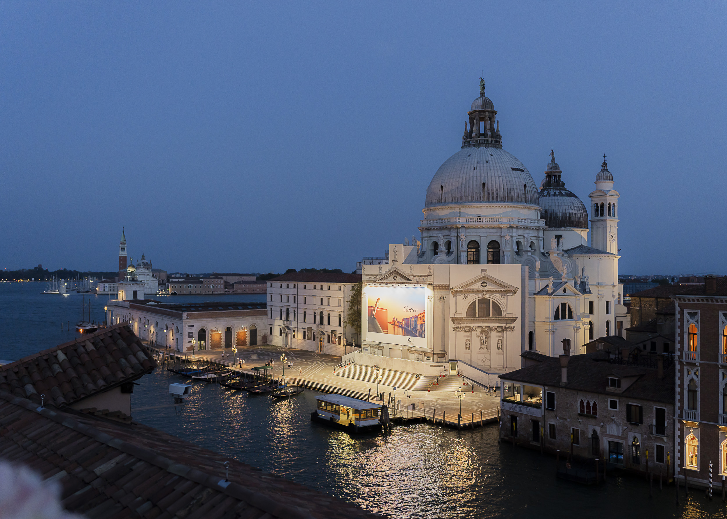 View across the Grand Canal from a rooftop in Venice at sunset