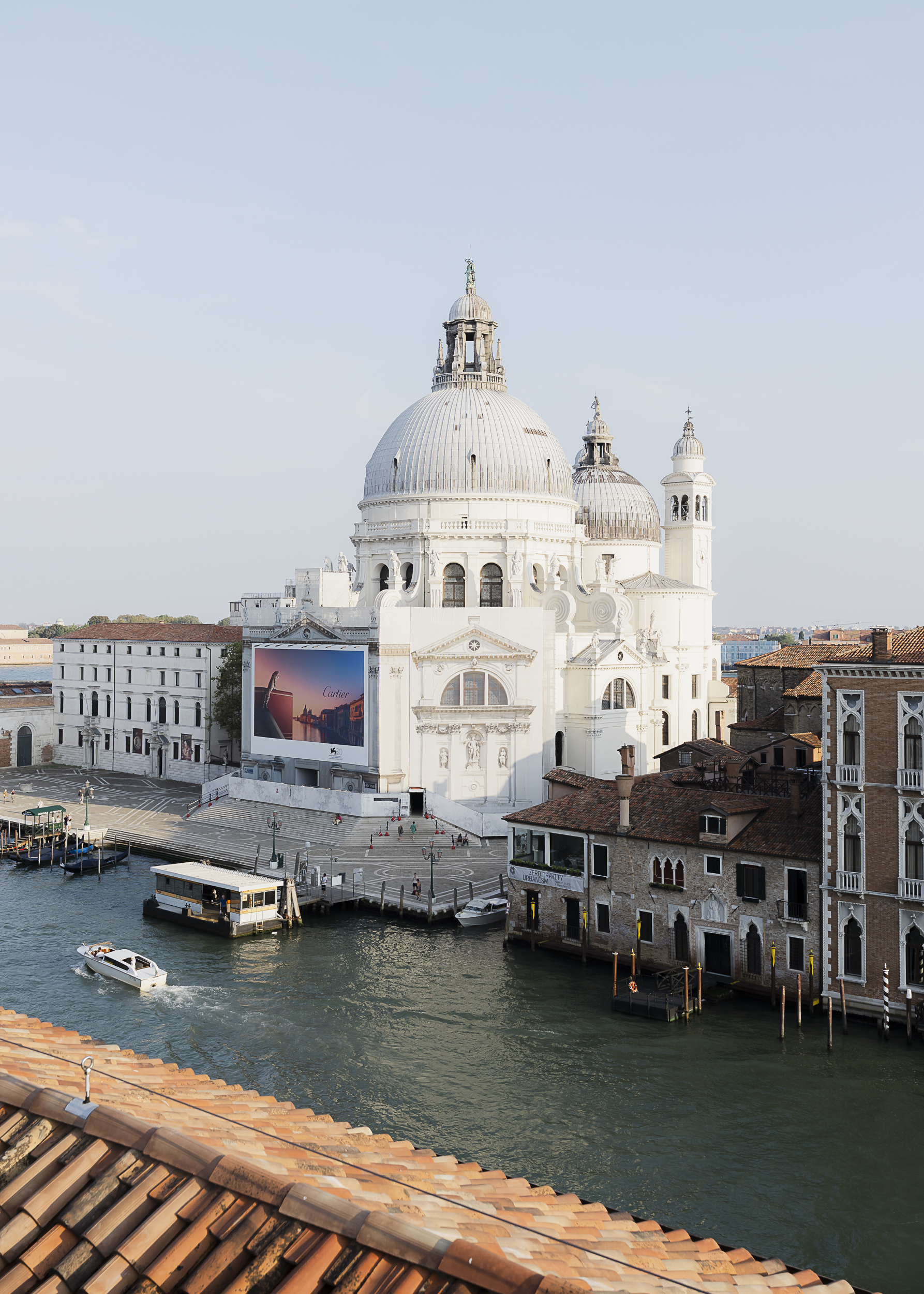 Gritti palace rooftop terrace celebration with Basilica di Santa Maria della Salute in the background.
