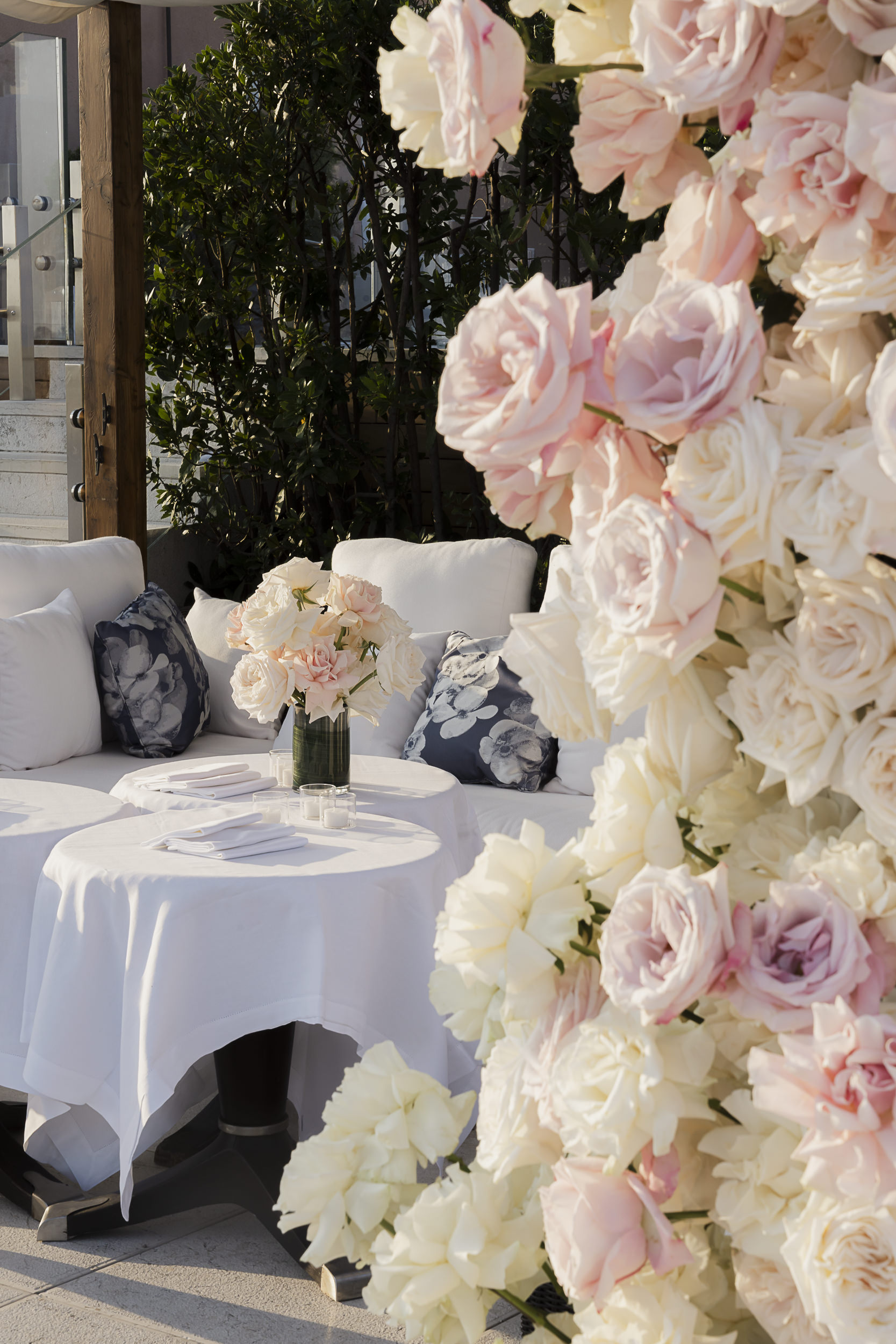 Pink and white floral styling at a rooftop celebration in Venice